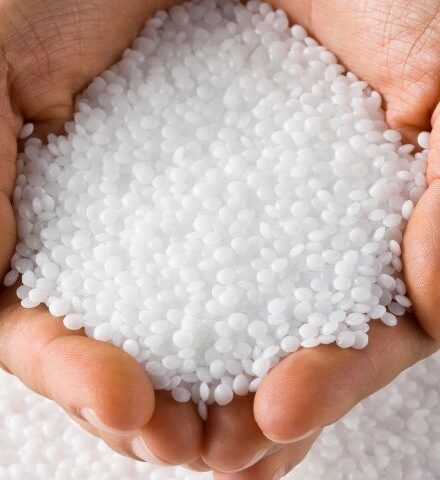 An image symbolizing the company profile page of CTE, featuring plastic pellets held in hands