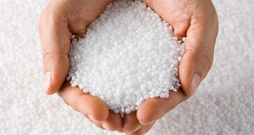 An image symbolizing the company profile page of CTE, featuring plastic pellets held in hands