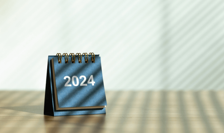 CTE's New Year greeting symbolized by a 2024 desk calendar standing on a wooden surface.